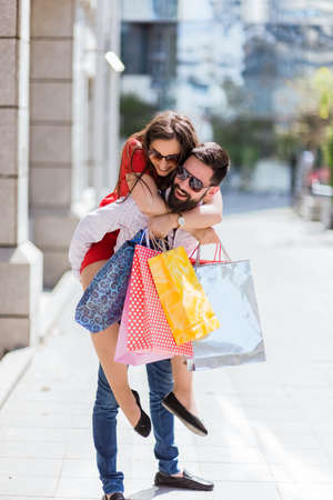 Shopping in the down town.Lovely couple having fun on the Macedonian streets,
on a sunshine day.の写真素材