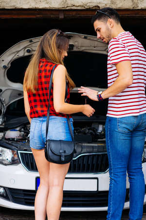 The car is finally fixed,you can have the car keys.の写真素材