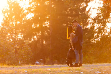 Two lovers sharing a moment before sunset.の写真素材