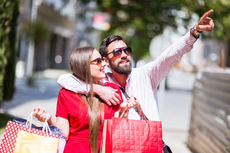 Shopping in the down town.Lovely couple having fun on the Macedonian streets,
on a sunshine day.の写真素材