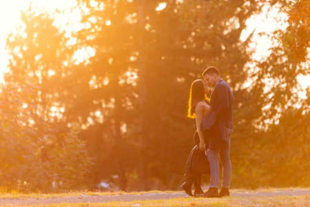 Two lovers sharing a moment before sunset.の写真素材