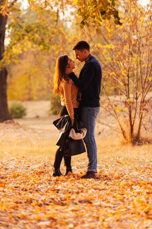 A new love story is about to begin under the autumn leaves.の写真素材