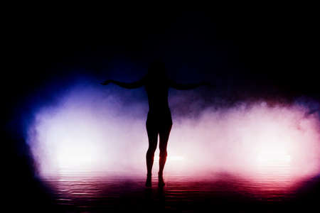 Caucasian female dancer exercising a contemporary dancing