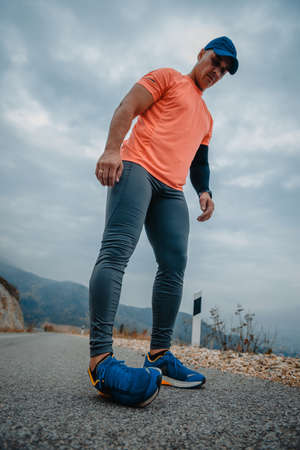 Healthy mature man in good shape getting ready for a run