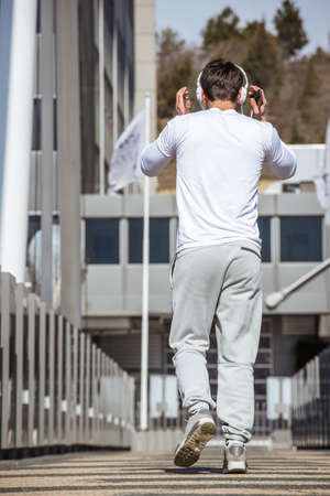 Training day of one fitness trainer while listening musicの写真素材