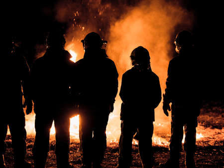 Fire station crew during an urgent operation at night time