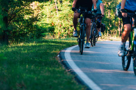 Group of cyclist rides as fast as they can while competing on a cycling marathon.の写真素材