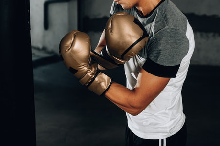 Handsome guy in sports wear prepare for hardwork trainingの写真素材