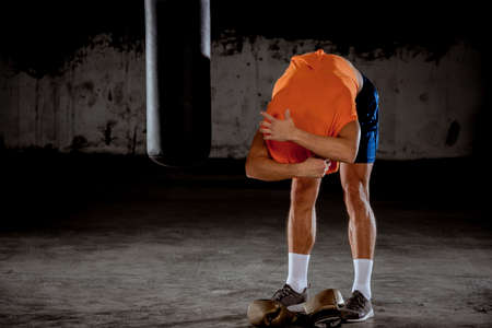 Young boxer prepare to practicing boxing in garageの写真素材