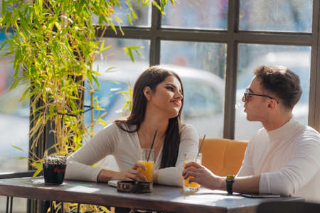 Couple hugging and enjoying time together. Lovers spending quality time together on a sunny day.の写真素材