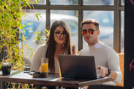 Co-workers spending time together on a break while working on a project on a lovely sunny day.の写真素材