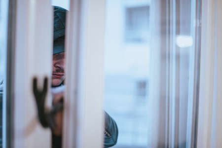 The burglar trying to break into someone's homeの写真素材