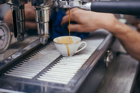 Espresso strong coffee with milk served at restaurantの写真素材