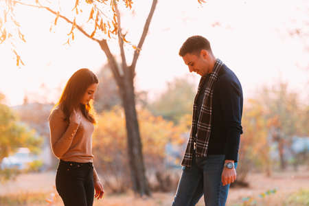 Young wild and free couple spending some quality time in a park.