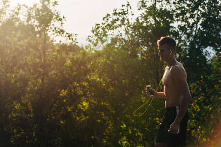 Ultra marathon trail shirtless runner with determination exercising for fitness and healthy...