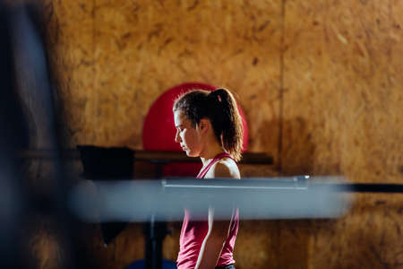 Healthy girl workout in the gymの写真素材