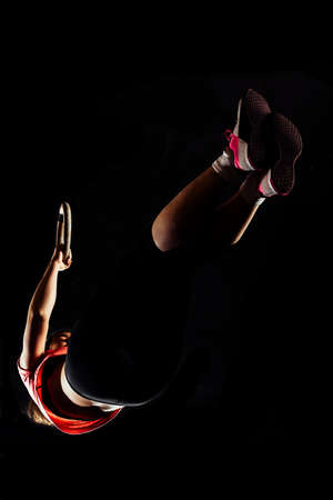 Young girl stretching muscles making functional training