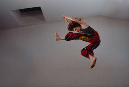Young dance performer during a dance practice at the studio