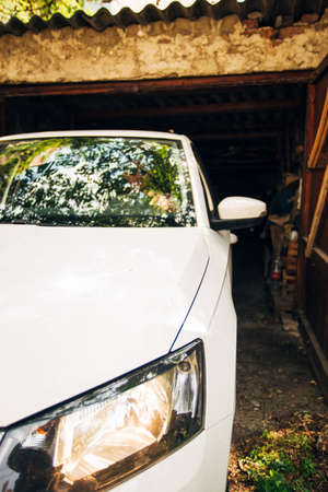 Adult guy taking his car from garageの写真素材