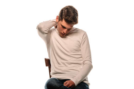 Portrait of a handsome stylish man posing in trendy modern clothing