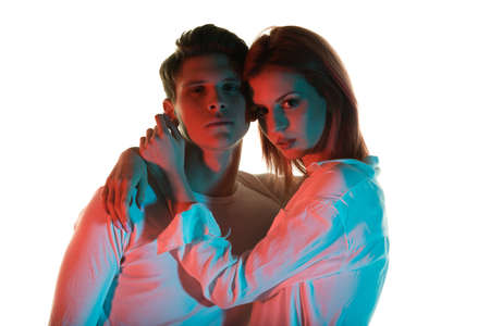 Beautiful romantic young couple embracing each other intimately