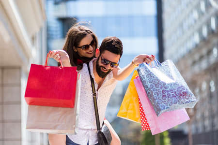 Shopping in the down town.Lovely couple having fun on the Macedonian streets,
on a sunshine day.の写真素材