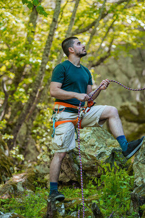 The climber makes an ascent to the top of the mountain