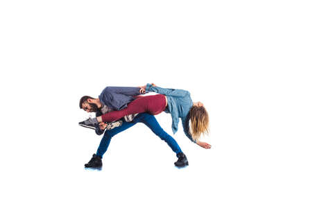 Cool couple is training aerobic on white background