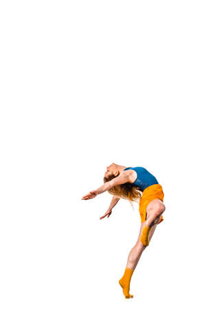Disco dancer showing some movements against isolated white backgroundの写真素材