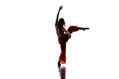 Graceful dance performer practicing dance moves at the studioの写真素材
