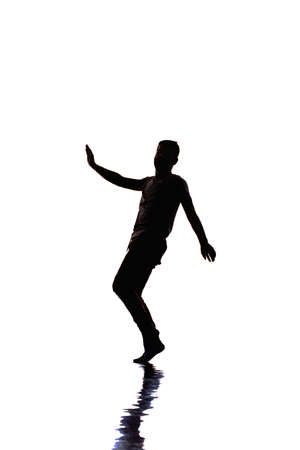 Cool guy doing brakdance on white backgroundの写真素材