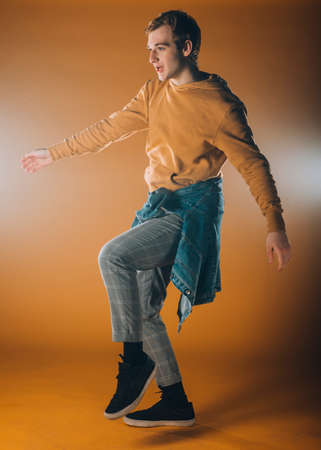 Dance moves performed by an acrobatic flexible male dancer