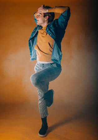 Young dance performer during a dance practice at the studioの写真素材