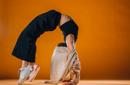 Dance moves performed by an acrobatic flexible female dancer
