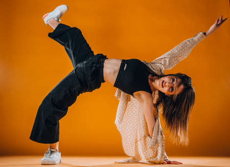 Modern and stylish dance artist during a dance exerciseの写真素材