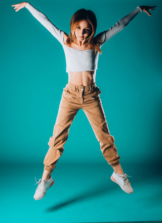 Beautiful girl performing a contemporary dance routineの写真素材