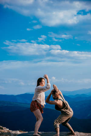 Sensual couple performing an artistical and emotional contemporary danceの写真素材