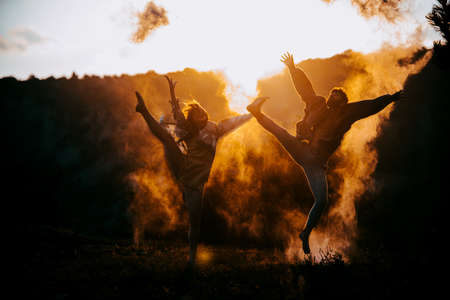 Romantic couple dancing and smiling outside at the mountain natureの写真素材