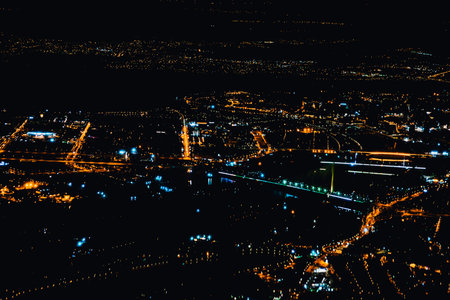 Wonderful panoramic view of urban city architecture at nightの写真素材