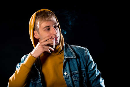 Cool handsome trendy guy wearing stylish hoody