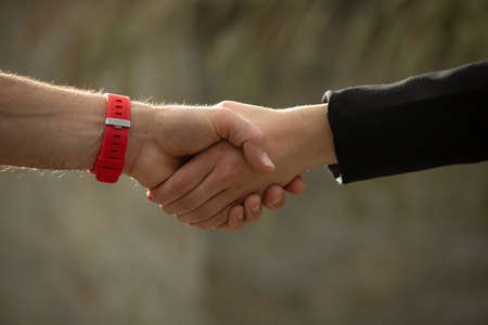 Close up picture of business people shaking handsの写真素材