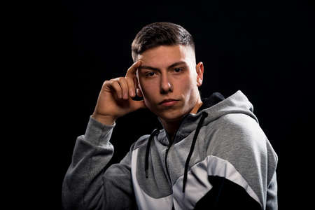 Studio body shot of a fashion male model wearing stylish clothesの写真素材