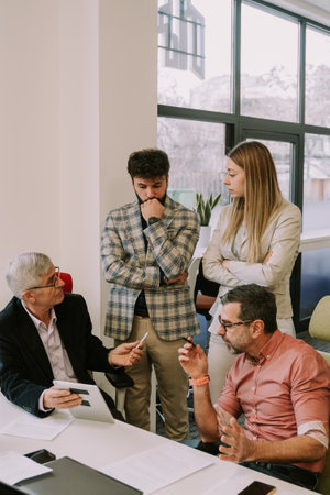 A companys boss asking his junior employees what they have done. They did a big mistake