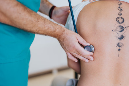 Expert Medical Professional Doing Test Results with Young Male Patientの写真素材