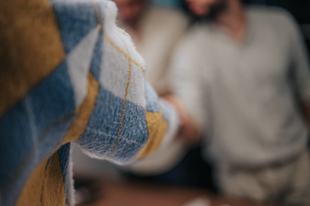Two colleagues in casual clothing saying goodbye with a handshake.の写真素材