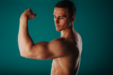 Aesthetic man flexing his bicep