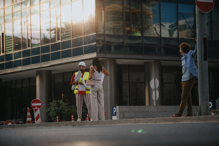 Successful Architects Discussing Sustainable Design in Urban Environmentの写真素材