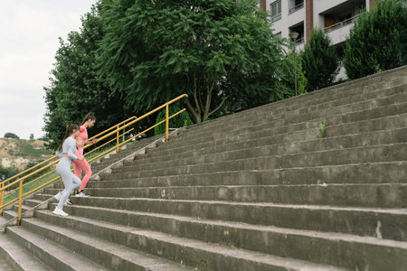 Active Friends Exercising in Urban Environment: Inspiring Outdoor Workout for a Healthy Lifestyle