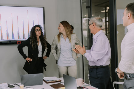 Happy coworkers enjoying working together. They are having funの写真素材