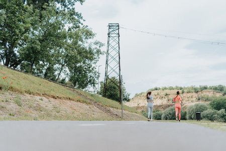 Active Women Embrace Outdoor Fitness Training in Urban Park